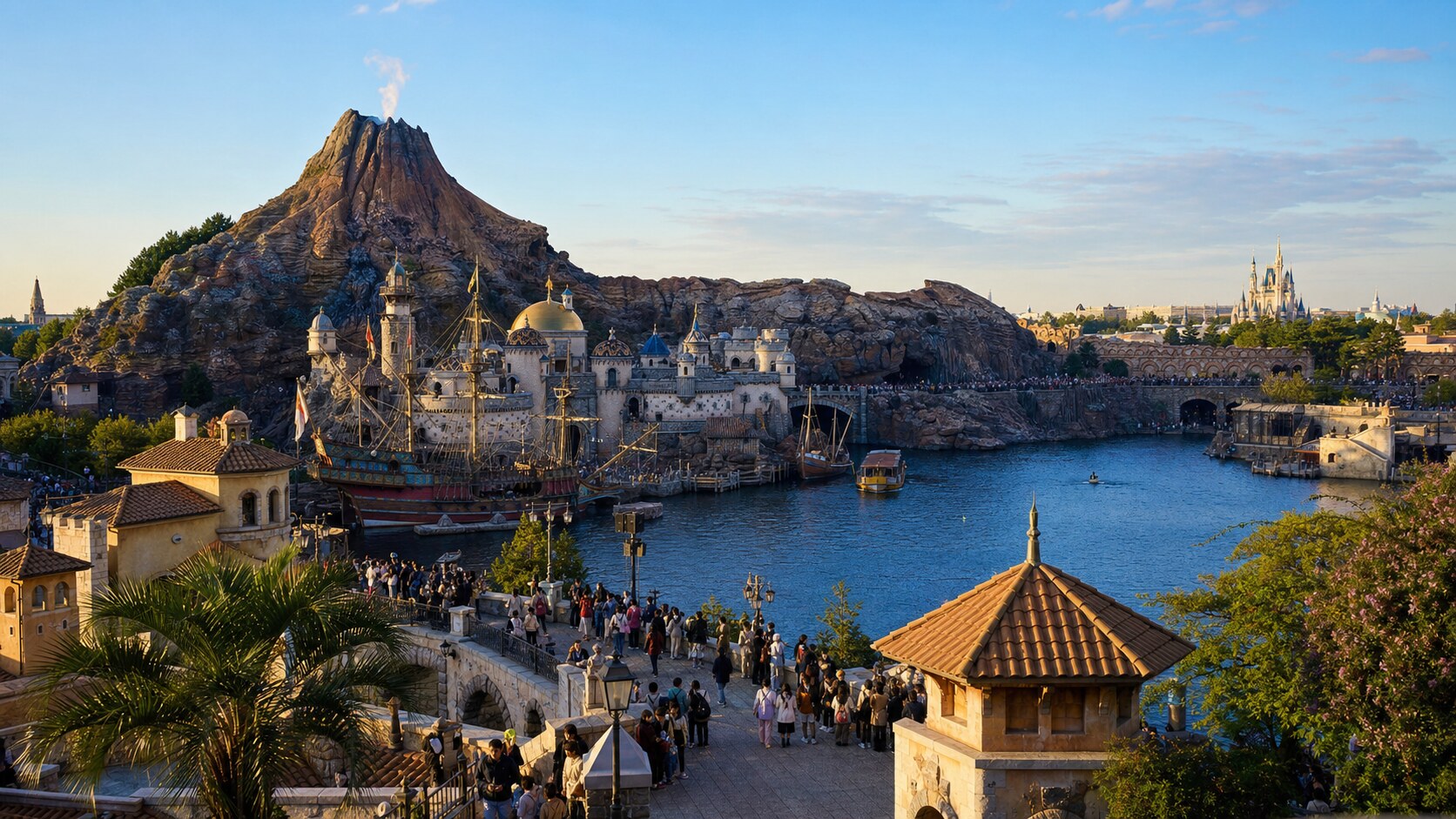 Tokyo DisneySea's Mediterranean Harbor and volcanic mountain with a fairytale castle visible in the distance